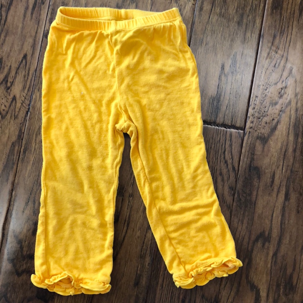 Kickee pants ruffle hem pants. 12-18M. Marigold.